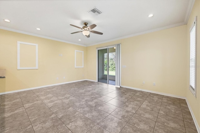 unfurnished room featuring visible vents, ornamental molding, baseboards, and ceiling fan