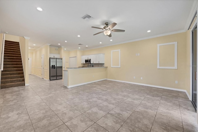 unfurnished living room featuring crown molding, recessed lighting, stairs, and ceiling fan