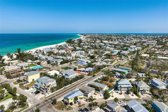 drone / aerial view featuring a water view and a residential view