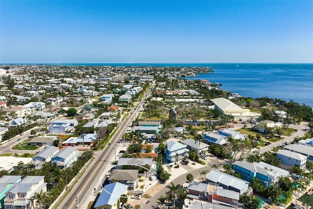 aerial view with a water view and a residential view