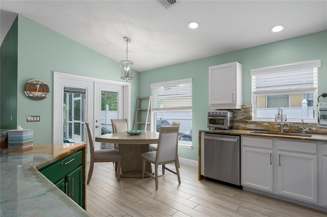 dining area featuring french doors, light wood-style flooring, visible vents, vaulted ceiling, and recessed lighting