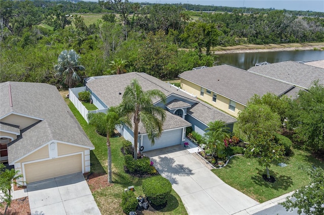 birds eye view of property featuring a water view