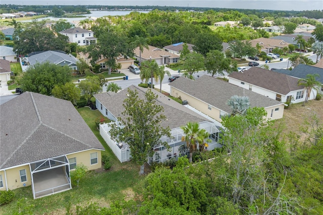 aerial view featuring a water view and a residential view