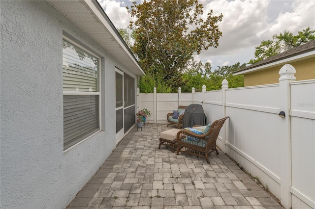 5209 Lansdowne Way, Palmetto, FL 34221 - view of patio / terrace featuring fence