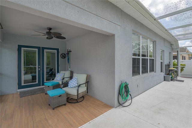 5209 Lansdowne Way, Palmetto, FL 34221 - view of patio featuring a ceiling fan and glass enclosure