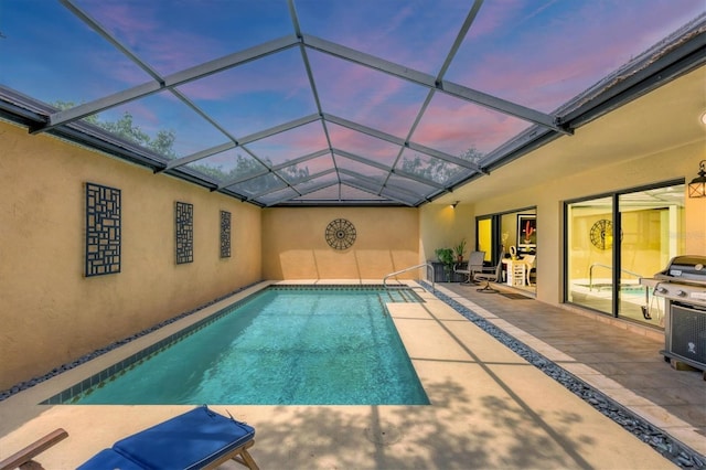 outdoor pool featuring a patio and a lanai