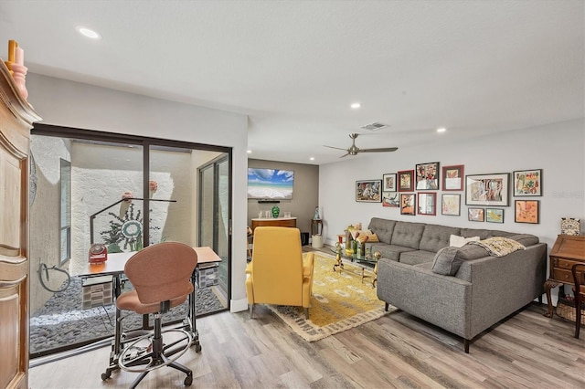 living room with visible vents, recessed lighting, light wood finished floors, and ceiling fan