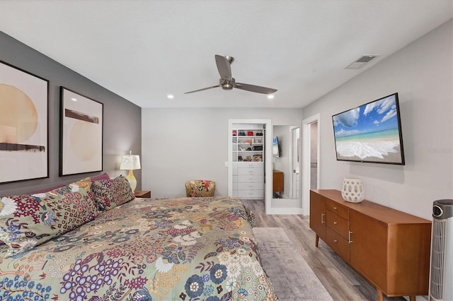 bedroom with recessed lighting, a ceiling fan, visible vents, and light wood-type flooring