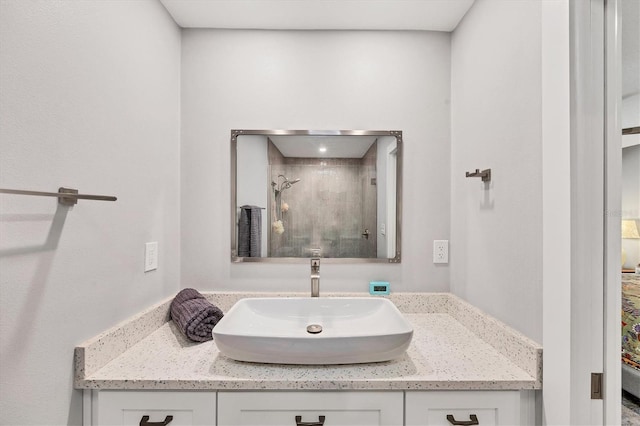 bathroom featuring vanity and a stall shower