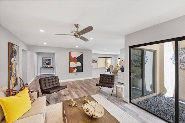 3955 Glen Oaks Manor Dr, Sarasota, FL 34232 - living area with a ceiling fan, light wood-style floors, and recessed lighting