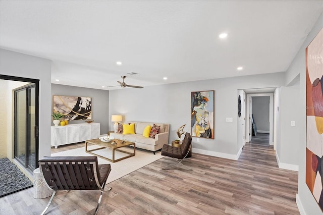 3955 Glen Oaks Manor Dr, Sarasota, FL 34232 - living area featuring wood finished floors, recessed lighting, and ceiling fan