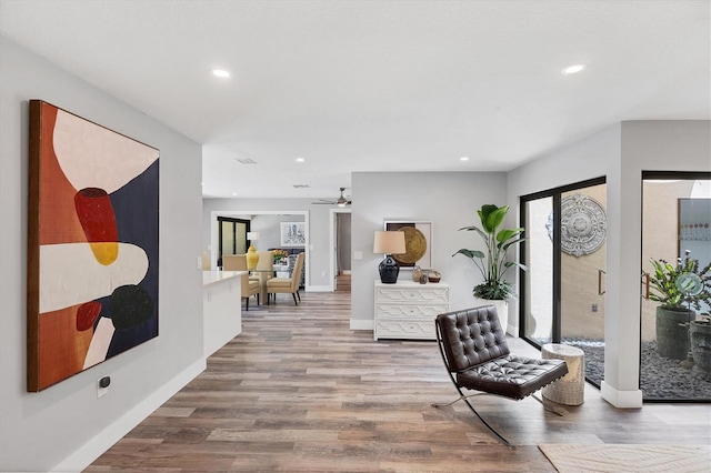 3955 Glen Oaks Manor Dr, Sarasota, FL 34232 - hallway with wood finished floors and recessed lighting