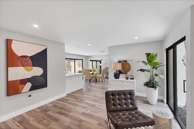 3955 Glen Oaks Manor Dr, Sarasota, FL 34232 - foyer entrance featuring light wood finished floors and recessed lighting