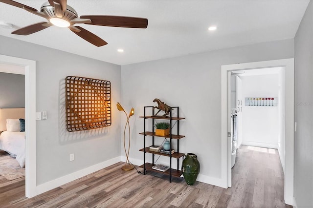 3955 Glen Oaks Manor Dr, Sarasota, FL 34232 - hallway with wood finished floors and recessed lighting