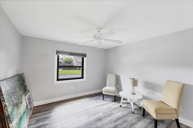 3955 Glen Oaks Manor Dr, Sarasota, FL 34232 - sitting room featuring wood finished floors and a ceiling fan