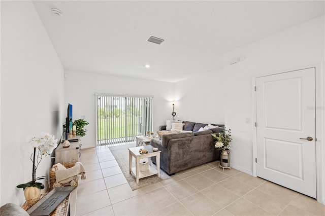 8545 Daybreak St, Sarasota, FL 34241 - living area with visible vents, baseboards, and light tile patterned floors