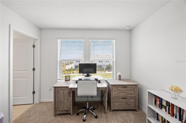 8545 Daybreak St, Sarasota, FL 34241 - office area featuring baseboards and a textured ceiling