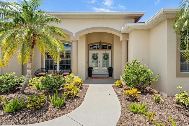 9012 Province St, Sarasota, FL 34240 - property entrance with french doors and stucco siding