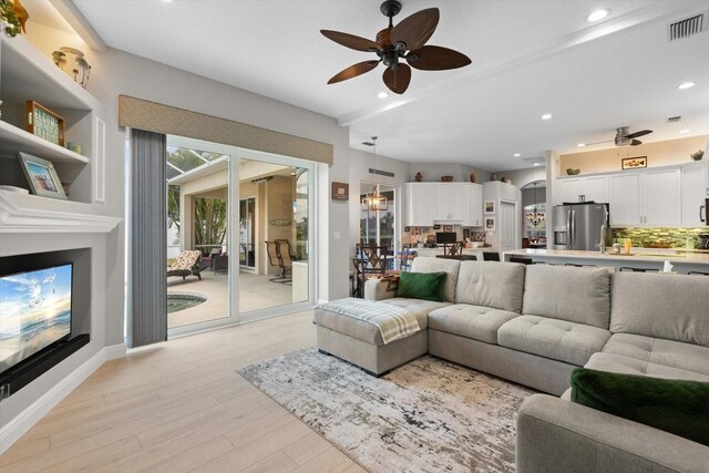 9012 Province St, Sarasota, FL 34240 - living area featuring ceiling fan, light wood-style flooring, recessed lighting, and baseboards