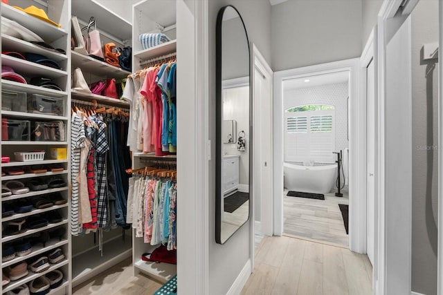 9012 Province St, Sarasota, FL 34240 - spacious closet with wood finished floors