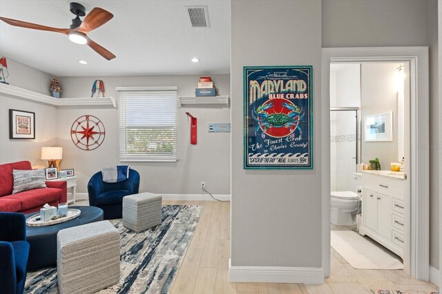 9012 Province St, Sarasota, FL 34240 - living area featuring a ceiling fan, baseboards, and recessed lighting