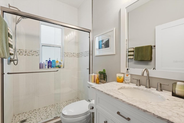 9012 Province St, Sarasota, FL 34240 - bathroom featuring toilet, a shower stall, and vanity