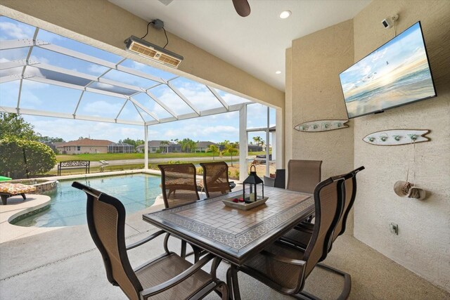 9012 Province St, Sarasota, FL 34240 - view of patio featuring a pool with connected hot tub, a lanai, and outdoor dining space