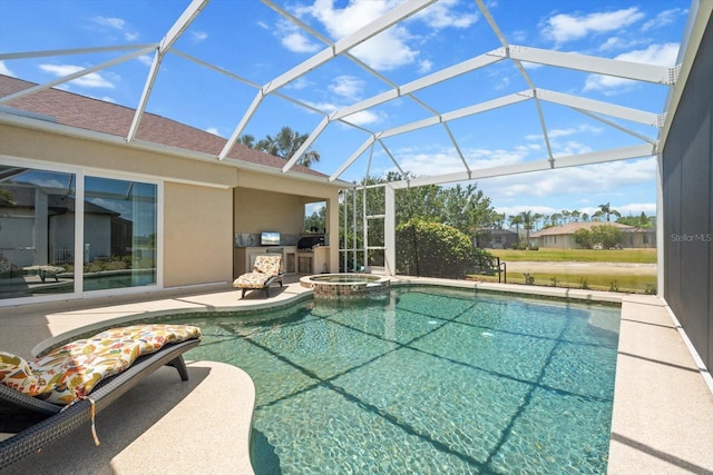 9012 Province St, Sarasota, FL 34240 - view of swimming pool featuring a patio, an outdoor kitchen, glass enclosure, and a pool with connected hot tub