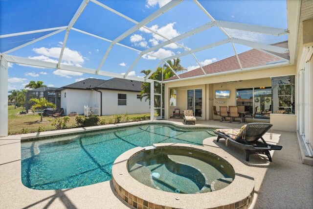9012 Province St, Sarasota, FL 34240 - view of pool with a patio, a pool with connected hot tub, and a lanai