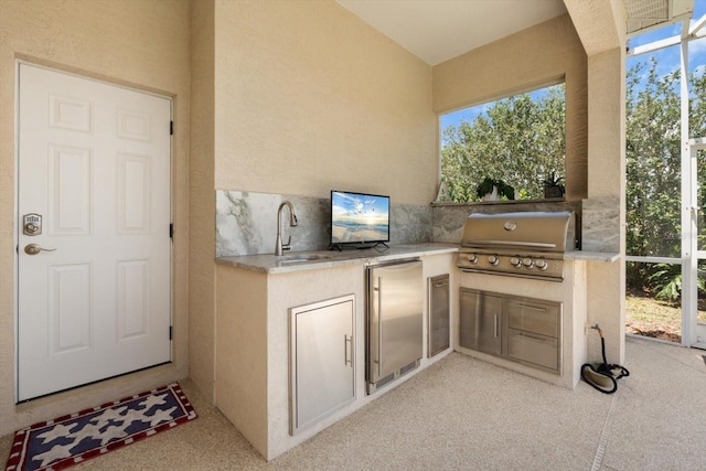 9012 Province St, Sarasota, FL 34240 - view of patio / terrace featuring a grill, an outdoor kitchen, and a sink