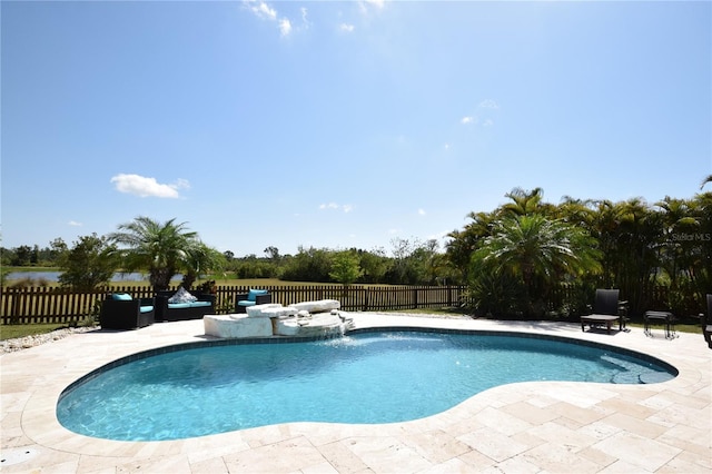 view of swimming pool featuring fence, a fenced in pool, and a patio area