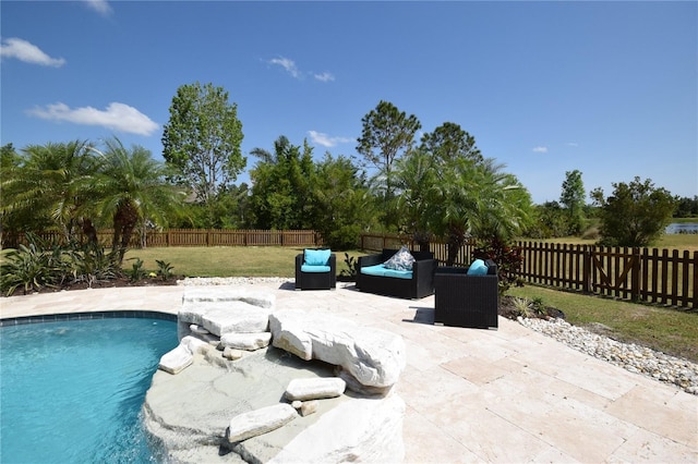 view of swimming pool with a fenced backyard, a fenced in pool, a patio area, a lawn, and a fire pit