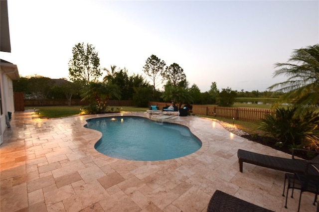 view of pool with a patio, a fenced in pool, and a fenced backyard