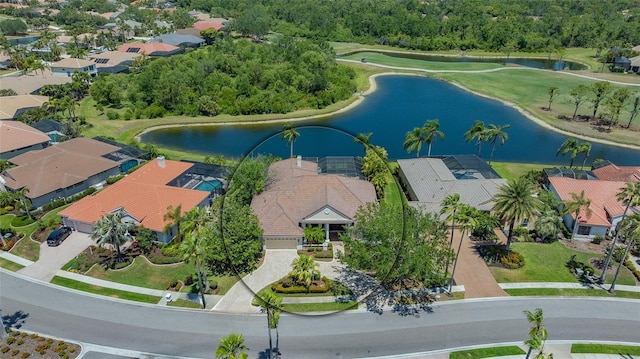 aerial view featuring a residential view, a water view, and golf course view