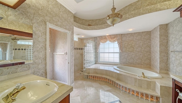 bathroom featuring wallpapered walls, walk in shower, a garden tub, and vanity