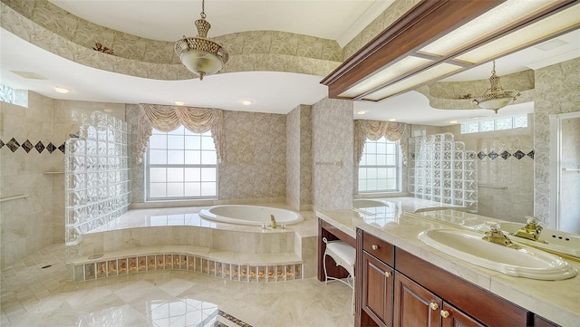 full bathroom featuring vanity, walk in shower, and a bath