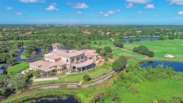 bird's eye view featuring a water view and view of golf course