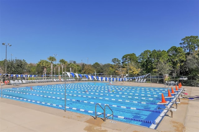 pool featuring fence
