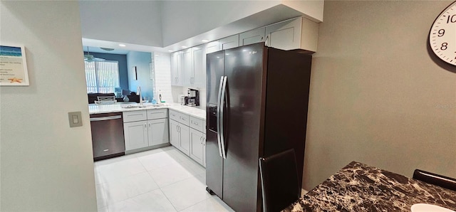 4415 45th Ave W Unit 203, Bradenton, FL 34210 - kitchen with ceiling fan, appliances with stainless steel finishes, a sink, light countertops, and light tile patterned floors
