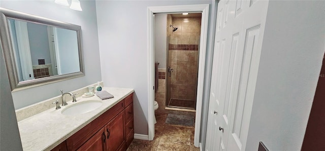4415 45th Ave W Unit 203, Bradenton, FL 34210 - bathroom with vanity, baseboards, a stall shower, and toilet