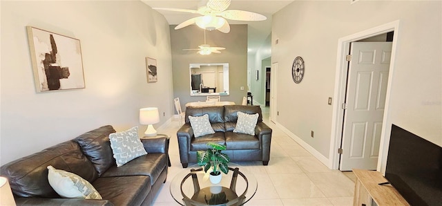 4415 45th Ave W Unit 203, Bradenton, FL 34210 - living room featuring baseboards, ceiling fan, light tile patterned floors, and high vaulted ceiling