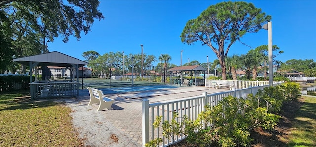 4415 45th Ave W Unit 203, Bradenton, FL 34210 - view of pool featuring a gazebo, fence, and a tennis court