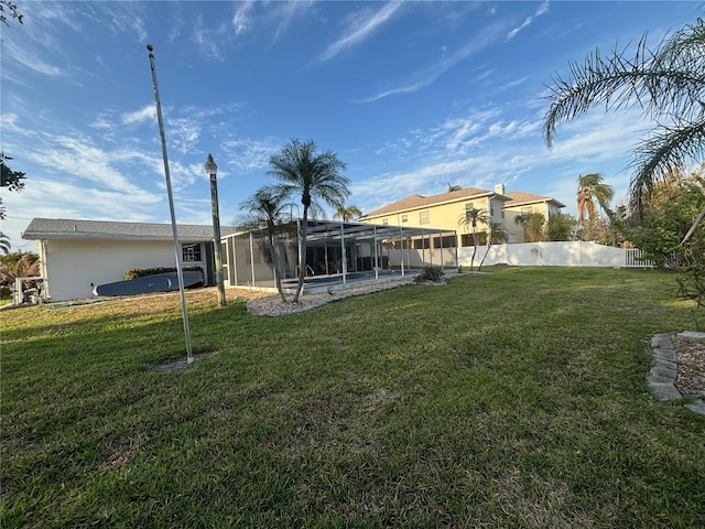 4411 Dolphin Ln, Palmetto, FL 34221 - view of yard featuring fence, a lanai, and a pool