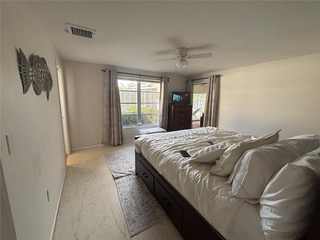4411 Dolphin Ln, Palmetto, FL 34221 - bedroom featuring visible vents, baseboards, and ceiling fan
