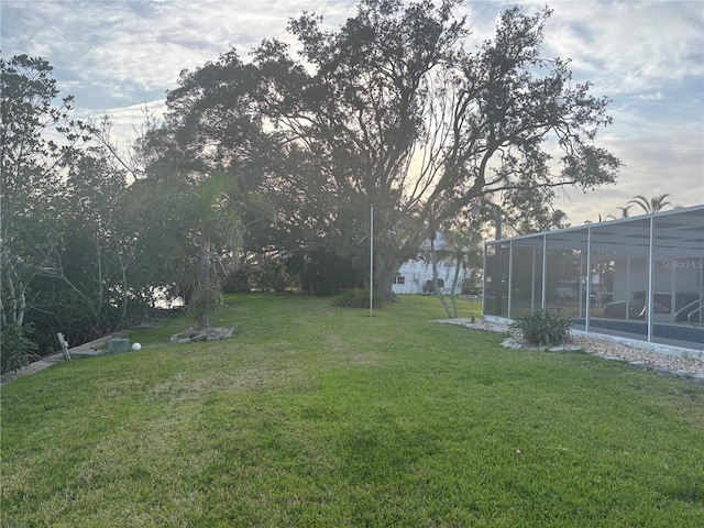4411 Dolphin Ln, Palmetto, FL 34221 - view of yard featuring a sunroom