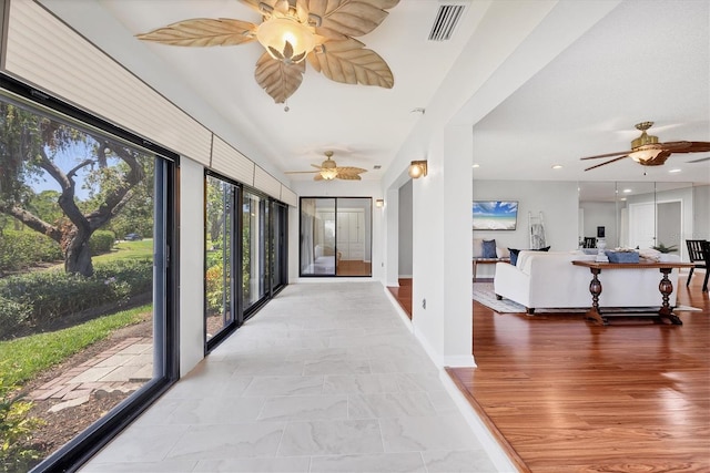 7374 Royal Birkdale Dr Unit 15D, Sarasota, FL 34238 - hallway with baseboards and visible vents