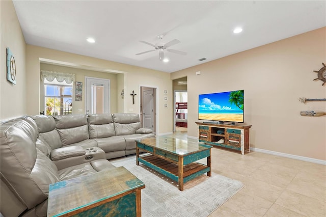 27243 Ipswich Dr, Englewood, FL 34223 - living room with a ceiling fan, visible vents, light tile patterned floors, baseboards, and recessed lighting