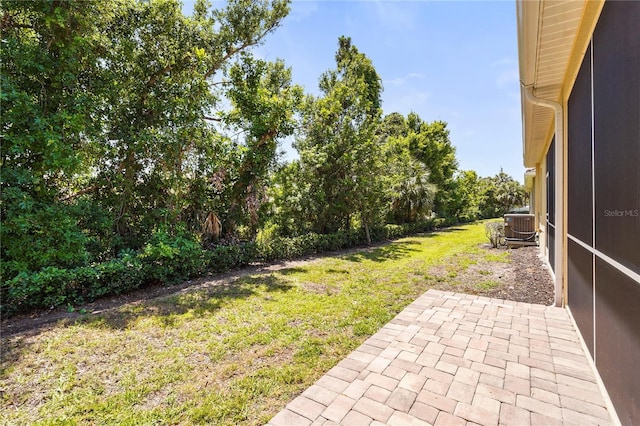 27243 Ipswich Dr, Englewood, FL 34223 - view of yard with a patio and central AC
