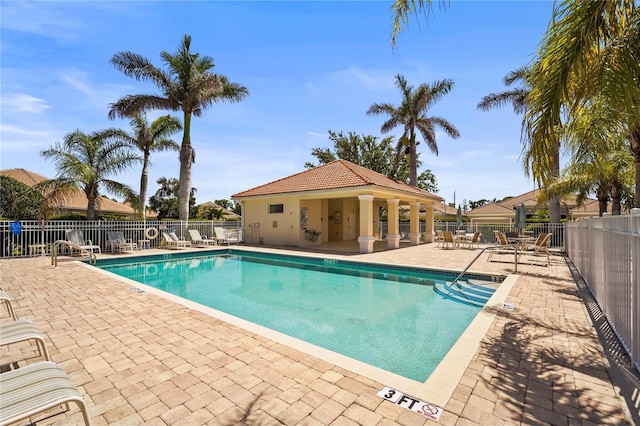 27243 Ipswich Dr, Englewood, FL 34223 - community pool featuring a patio and fence
