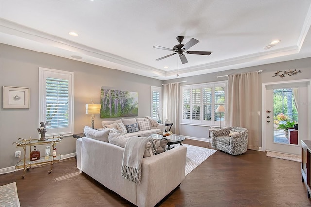 12133 Forest Park Cir, Bradenton, FL 34211 - living room featuring a raised ceiling, a ceiling fan, healthy amount of natural light, baseboards, and recessed lighting